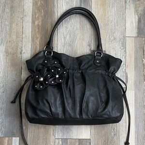 Claire's Elegant Black Shoulder Bag with Floral Accents